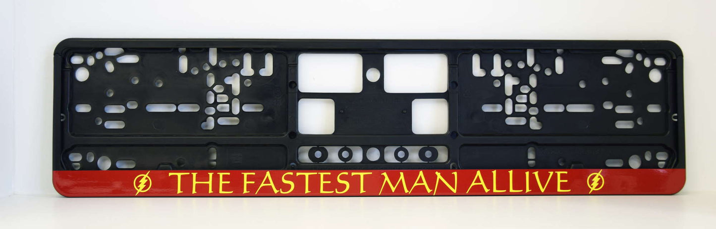 Auto numura turētājs ar uzrakstu - The fastest man alive